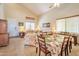 Bright and airy living room with comfortable seating and plenty of natural light at 18118 N Smith Dr, Maricopa, AZ 85139