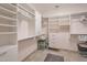 Large walk-in closet with custom shelving and ample storage space at 18118 N Smith Dr, Maricopa, AZ 85139
