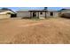 Spacious backyard with dirt and patio at 2127 W Marco Polo Rd, Phoenix, AZ 85027