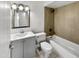 Updated bathroom with a modern vanity, tiled shower, and a bathtub for a spa-like experience at 2127 W Marco Polo Rd, Phoenix, AZ 85027