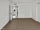 Bedroom with neutral carpet and a doorway leading to another room at 2127 W Marco Polo Rd, Phoenix, AZ 85027