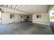 Spacious carport area with backyard entrance, desert landscaping, and neutral color scheme at 2400 E Baseline Ave # 197, Apache Junction, AZ 85119