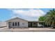 Single-story home with neutral siding, carport, and desert landscaping at 2400 E Baseline Ave # 197, Apache Junction, AZ 85119