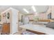 Bright kitchen featuring white cabinets, modern appliances, and a functional layout at 2400 E Baseline Ave # 197, Apache Junction, AZ 85119