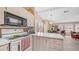 Bright kitchen showcasing an open layout that flows to the living area at 2400 E Baseline Ave # 197, Apache Junction, AZ 85119