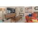 Comfortable living room featuring a large TV, stylish furniture, and ample natural light at 2400 E Baseline Ave # 197, Apache Junction, AZ 85119