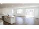 Spacious living room featuring recessed lights and sliding glass door leading to backyard at 2482 W Rowel Rd, Phoenix, AZ 85085