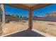 View of a spacious backyard ready for landscaping, enclosed by block fencing at 25539 W Gwen St, Buckeye, AZ 85326