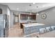 Spacious kitchen with a granite island, dark wood cabinets, and stainless steel appliances at 26141 N 133Rd Ave, Peoria, AZ 85383