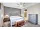 Serene main bedroom with neutral tones, carpet floors, and an ensuite bathroom at 26141 N 133Rd Ave, Peoria, AZ 85383