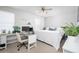 Bright bedroom with a comfortable bed, a desk, and ample natural light from the window at 307 W Piute Ave, Phoenix, AZ 85027