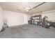 Spacious garage with ample storage space, concrete flooring, and convenient access to the home at 307 W Piute Ave, Phoenix, AZ 85027