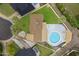 Aerial view of home showcasing the pool, spacious yard, and neighboring properties at 3707 E Amelia Ave, Phoenix, AZ 85018