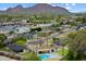 Scenic aerial view of the property, highlighting the backyard pool and mountain backdrop at 3707 E Amelia Ave, Phoenix, AZ 85018