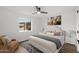 Bedroom featuring a serene atmosphere, completed with a cozy bed, stylish lamps, and inviting decor at 3707 E Amelia Ave, Phoenix, AZ 85018