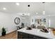 Stylish kitchen with a view to the dining area and living room, perfect for entertaining at 3707 E Amelia Ave, Phoenix, AZ 85018