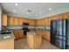 Well-equipped kitchen featuring granite countertops, stainless steel appliances, and ample cabinet space at 3719 E Longhorn St, San Tan Valley, AZ 85140