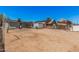 A partially fenced backyard offers possibilities for landscaping and outdoor activities at 3913 W Sherman St, Phoenix, AZ 85009