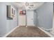 Minimalist room featuring carpeted floors and plain, light walls at 3913 W Sherman St, Phoenix, AZ 85009