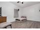 Compact bedroom features neutral walls, ceiling fan, and basic furnishings at 3913 W Sherman St, Phoenix, AZ 85009