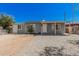 Charming single-story home with gravel landscaping, covered porch, and freshly painted gray exterior at 3913 W Sherman St, Phoenix, AZ 85009