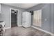 Functional kitchen with stainless steel appliances, ample counter space, and stylish gray flooring at 3913 W Sherman St, Phoenix, AZ 85009