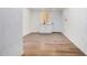 Empty room with sink/cabinet feature and wood look floors at 3913 W Sherman St, Phoenix, AZ 85009