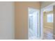 En suite bathroom featuring a glass-enclosed shower and direct access from the main bedroom at 41004 W Crane Dr, Maricopa, AZ 85138