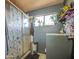 Bathroom featuring shower with patterned glass door at 4545 N 67Th Ave # 1101, Phoenix, AZ 85033
