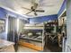 This secondary bedroom includes a bunk bed and a ceiling fan for enhanced comfort at 4545 N 67Th Ave # 1101, Phoenix, AZ 85033