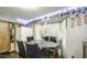 Dining room with white shutters and table setting at 4545 N 67Th Ave # 1101, Phoenix, AZ 85033