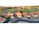 Aerial view of houses and street with lawns and other landscaping features at 4545 N 67Th Ave # 1101, Phoenix, AZ 85033