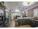 Updated kitchen featuring stainless steel appliances, modern fixtures, and ample counter space at 4545 N 67Th Ave # 1101, Phoenix, AZ 85033