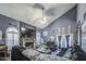 Comfortable living room with fireplace, vaulted ceiling, and ceiling fan at 4545 N 67Th Ave # 1101, Phoenix, AZ 85033