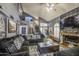 Well decorated living room featuring a ceiling fan, fireplace, and comfortable seating at 4545 N 67Th Ave # 1101, Phoenix, AZ 85033