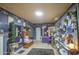 Inviting room with unique decor, tile flooring, and decorative wall art at 4545 N 67Th Ave # 1101, Phoenix, AZ 85033