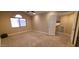 Large, bright bedroom features a window and ceiling fan at 5640 E Bell Rd # 1047, Scottsdale, AZ 85254