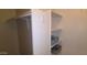 A well-organized walk-in closet featuring built-in shelving, a hanging rod, and ample storage space at 5640 E Bell Rd # 1047, Scottsdale, AZ 85254