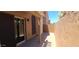 Outdoor patio area offers privacy with walls and features a pergola, ideal for relaxation and entertaining at 5640 E Bell Rd # 1047, Scottsdale, AZ 85254