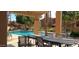 Inviting community pool with seating area and lush landscaping creating a perfect resort-like experience at 5640 E Bell Rd # 1047, Scottsdale, AZ 85254