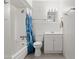 Bathroom featuring a bathtub with shower, toilet, and sink with mirror at 5802 N 61St Dr, Glendale, AZ 85301
