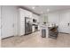 Open floor plan boasts kitchen with stainless appliances and granite countertops at 5897 N 195Th Dr, Litchfield Park, AZ 85340