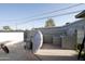 This backyard features block wall fencing and space for parking and entertainment, a blank canvas at 6101 N 31St Dr, Phoenix, AZ 85017