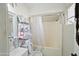 This bathroom features a vanity, mirror, toilet and a bathtub and shower combo with a shower curtain at 6101 N 31St Dr, Phoenix, AZ 85017
