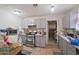 Kitchen featuring neutral gray cabinets and modern appliances at 6101 N 31St Dr, Phoenix, AZ 85017