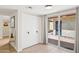 Bright bedroom with sliding glass doors to the patio and a large closet with storage at 6147 E Lewis Ave, Scottsdale, AZ 85257