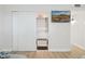 Bedroom featuring an open closet space and a desert-themed TV display at 6147 E Lewis Ave, Scottsdale, AZ 85257