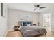 Bedroom with neutral walls, shuttered windows, and an ensuite bathroom at 6147 E Lewis Ave, Scottsdale, AZ 85257