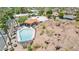 Gorgeous community pool surrounded by lush greenery with mountain views, perfect for relaxation and recreation at 6147 E Lewis Ave, Scottsdale, AZ 85257
