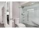 Updated bathroom with glass shower, tile flooring, and modern fixtures at 6480 N 82Nd St # 1136, Scottsdale, AZ 85250